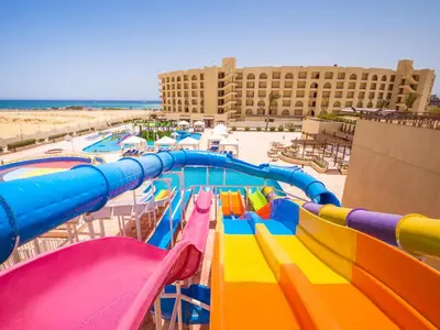 a colorful water slide at a water park at Sunny Days Mirette Family Resort in Hurghada