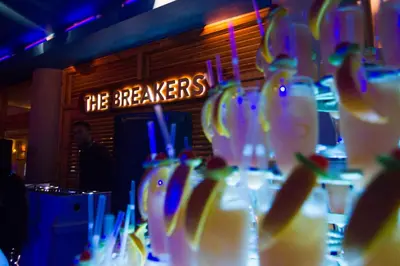 a group of glasses with fruit in a bar at The Breakers Diving and Surfing Lodge Soma Bay in Hurghada