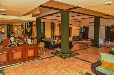 a lobby with a bar in a hotel at Eagles Paradise Abu Soma Resort in Hurghada