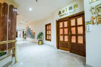 an asianacistacistacistacist entrance to a building with a door at Pharaoh Azur Resort in Hurghada
