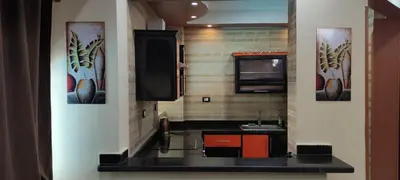 a small kitchen with a sink and a counter at Hurghada Big private villa for families in Hurghada