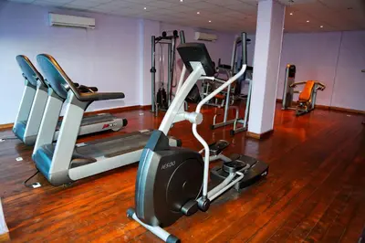 a gym with a bunch of cardio machines at Coral Sun Beach in Safaga