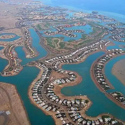 an aerial view of a city with a harbor at Twin Lagoon Apartment at White Villas El Gouna in Hurghada