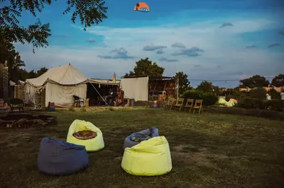 a kite flying in the sky over a tent at Nuba Narty in Aswan