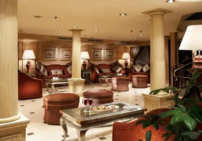 a lobby with couches and chairs and a table at JAZ Crown Jubilee Nile Cruise - Every Thursday from Luxor for 07 & 04 Nights - Every MondayFrom Aswan for 03 Nights in Luxor