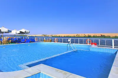 a large swimming pool on a cruise ship at JAZ Crown Jubilee Nile Cruise - Every Thursday from Luxor for 07 & 04 Nights - Every MondayFrom Aswan for 03 Nights in Luxor