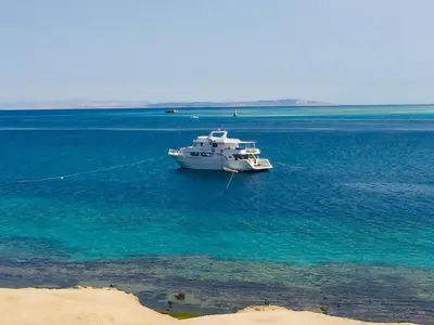 a boat in the middle of the water at Angie House Embassy area with wi fi in Hurghada