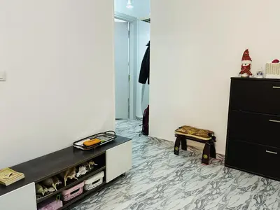 a room with a dresser and a closet at Angie House Embassy area with wi fi in Hurghada