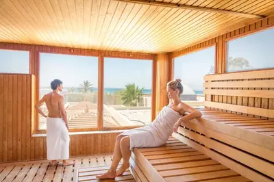a man and a woman in a sauna at Robinson Soma Bay in Hurghada