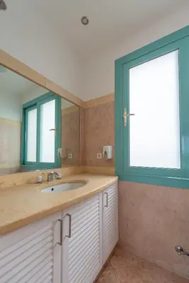 a bathroom with a sink and a large window at Stunning Villa for Rent in El Gouna HEATED PRIVATE POOL in Hurghada