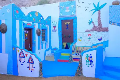 a play house painted in blue and white at Nubian Palace Eco Lodge - A Nubian Home Since 1959 in Aswan