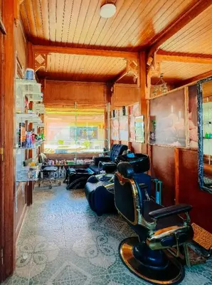 a room with a barber shop with a hair salon at Mangrove Bay Resort in Quseir