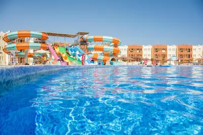 a water park with a water slide and slides at Sunrise Royal Makadi Resort in Hurghada