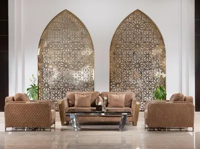 a living room with two chairs and a table at Pickalbatros Dana Beach Resort - Aqua Park in Hurghada