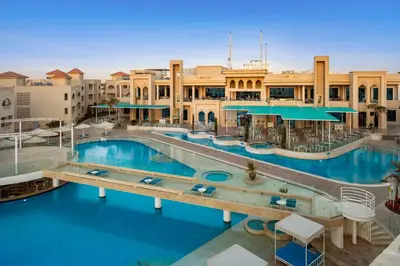 an aerial view of a resort with two pools at Pickalbatros Aqua Blu Resort - Hurghada in Hurghada