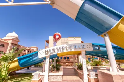 a water park with a slide at the amusement bar at Pickalbatros Aqua Park Resort - Hurghada in Hurghada