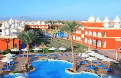 an aerial view of a resort with a swimming pool at Pickalbatros Alf Leila Wa Leila Resort - Neverland Hurghada in Hurghada