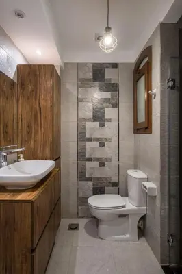 a bathroom with a toilet and a sink at El Gouna 1 Bedroom Apartment west golf ground floor in Hurghada