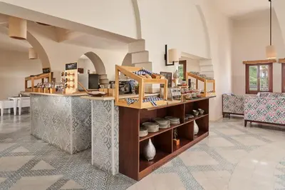 a kitchen with a counter in a room at Mosaique Hotel El Gouna in Hurghada