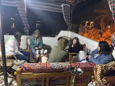a group of people sitting in a room at Seko Kato Nile View Hostel in Aswan