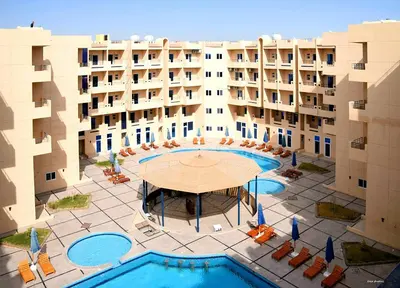 an aerial view of the courtyard of a hotel at tiba resort hurghada A16 in Hurghada
