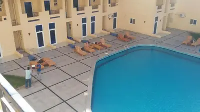 an overhead view of a swimming pool in a building at tiba resort hurghada A16 in Hurghada