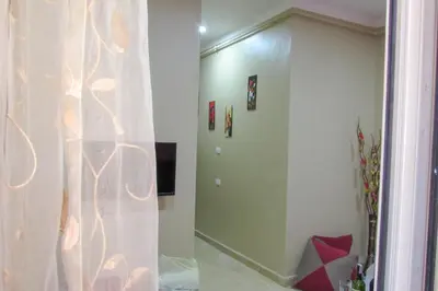 a room with a hallway with a door and a room with at Apartments Desert rose near the sea RedSeaLine in Hurghada