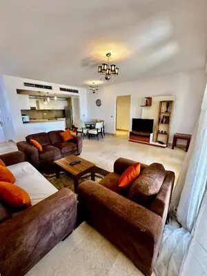 a large living room with couches and a table at New Marina MP 37 in Hurghada