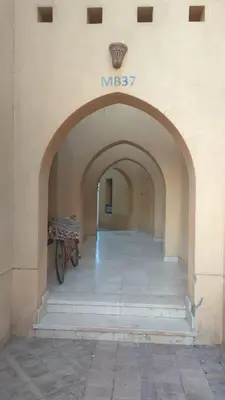 an archway in a building with a bike on it at New Marina MP 37 in Hurghada