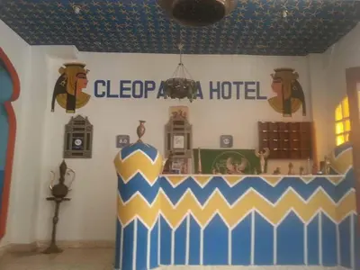 a room with a blue and yellow cheep a hotel at Cleopatra Hotel Luxor in Luxor