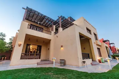 a large building with a balcony on top of it at El Gouna 2 bedrooms apartment South Marina Ground Floor in Hurghada