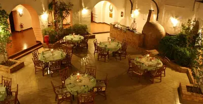 an overhead view of a restaurant with tables and chairs at Arabella Azur Resort in Hurghada
