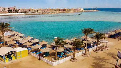 an aerial view of a resort with a pool and beach at Bel Air Azur Resort (Adults Only) in Hurghada