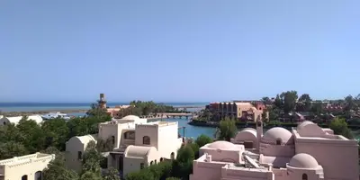 a view of a town with houses and the ocean at EL Gouna Abu tig marina studio- economy stay in Hurghada