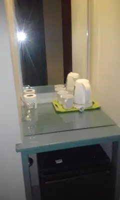a bathroom counter with a sink and a mirror at EL Gouna Abu tig marina studio- economy stay in Hurghada