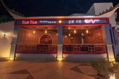 a building with a sign that reads your christmas music at MinaMark Beach Resort for Families and Couples Only in Hurghada