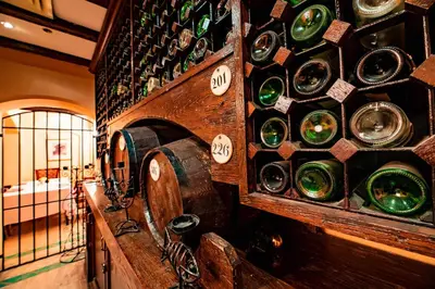 a room with a wall full of wine bottles at Continental Hotel Hurghada in Hurghada