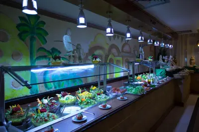 a buffet line with salads and desserts on display at Le Pacha Resort in Hurghada