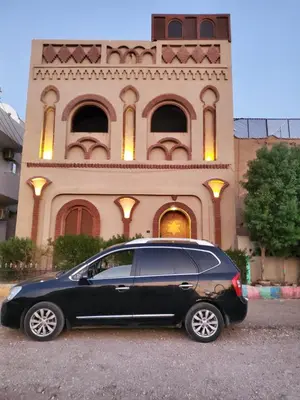 a black car parked in front of a building at Shahhat House in Luxor