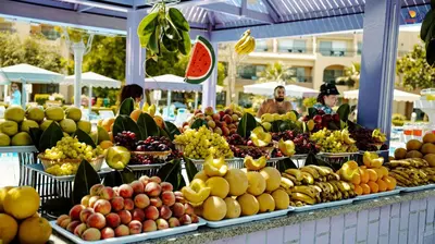 a display of fruits and vegetables in a market at Ali Baba Palace Resort in Hurghada
