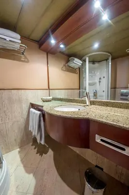a bathroom with a sink and a mirror at Nile Cruise King Tut in Luxor