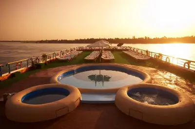 a cruise ship with a pool on the water at Nile Carnival Cruise 4nt Lxr Thursday 3nt Asw Monday in Luxor