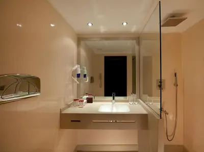 a bathroom with a sink and a mirror at Steigenberger Minerva Nile Cruise - Every Thursday from Luxor for 07 & 04 Nights - Every Monday From Aswan for 03 Nights in Luxor