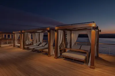 a deck on a yacht with a bunch of chairs at JAZ Elite Senator Nile Cruises - Every Thursday from Luxor for 07 Nights & Every Thursday from Luxor for 05 Nights in Luxor