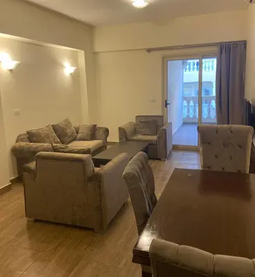a large living room with couches and a table at Bahga Palace 2 Residential Apartments in Hurghada