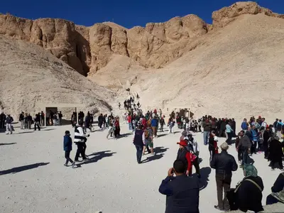 a large group of people walking in the desert at Sunflower Guest House Luxor West Bank in Luxor