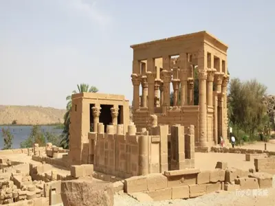 an ancient building with columns in front at Nile Cruises 5 Stars From From Aswan 03 Nights -From Luxor 04 Nights in Luxor