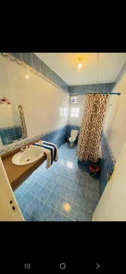 a bathroom with a sink and a toilet at Leyla Eco Resort in Luxor