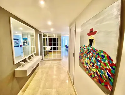 a painting of a dress on a wall in a hallway at El Gouna Abu Tig Marina OV3550 in Hurghada