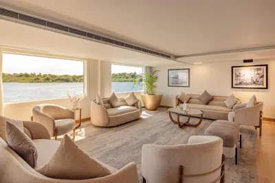 a large living room with couches and chairs at Sonesta Star Goddess Cruise - Luxor- Aswan - 04 & 07 nights Each Saturday in Luxor